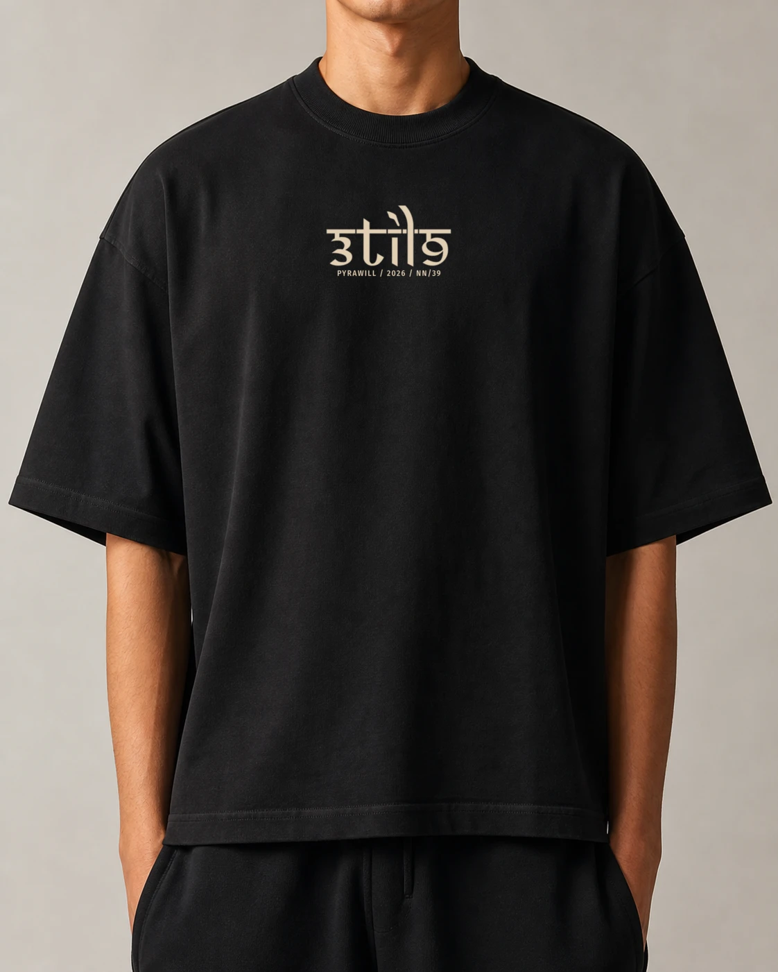 Передняя сторона чёрной Pyrawill 2026 boxy tee with the small 3til9 numbered signature
